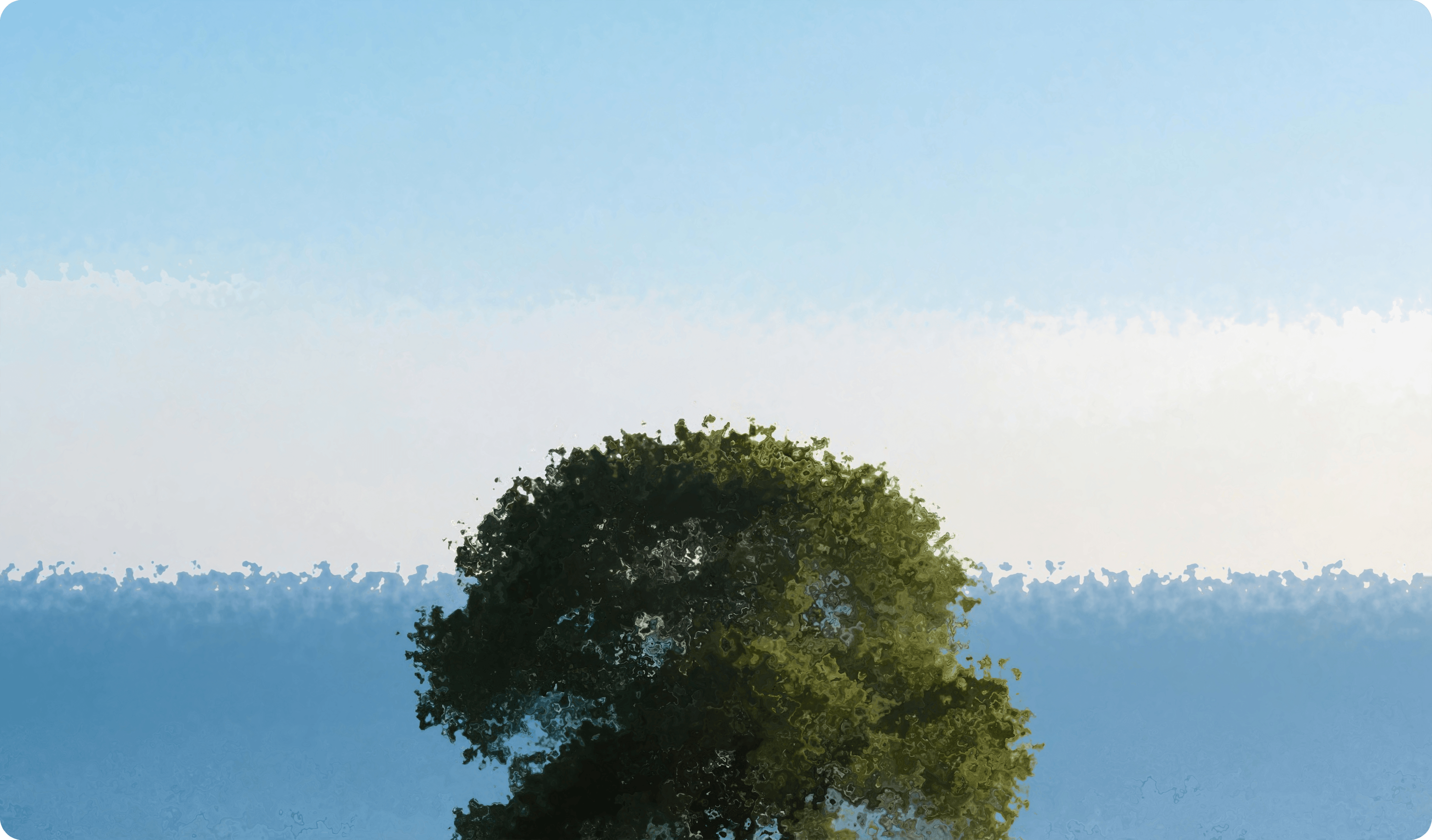 A solitary tree beneath a blue landscape